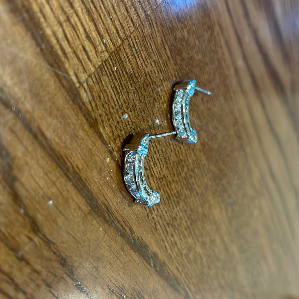 Silver half hoop earrings with gems